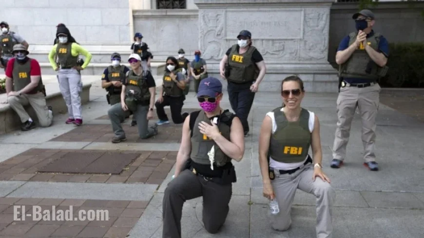 FBI Agents Sue Alleging Unlawful Dismissal Over Protest Kneeling