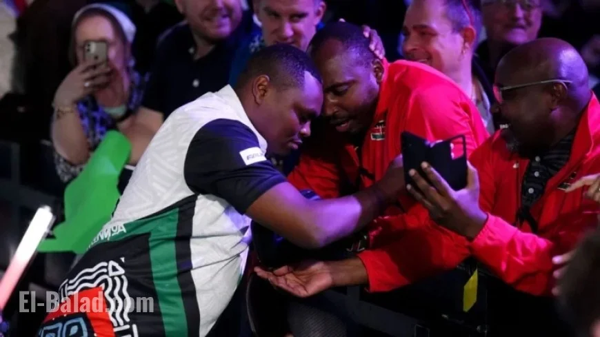 Veterinarian David Munyua Upsets 18th Seed Mike De Decker at World Darts Championship