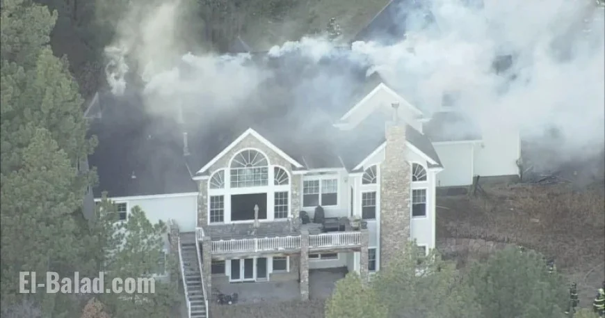 Colorado Firefighters Swiftly Battle Franktown Garage Fire Spreading to Home