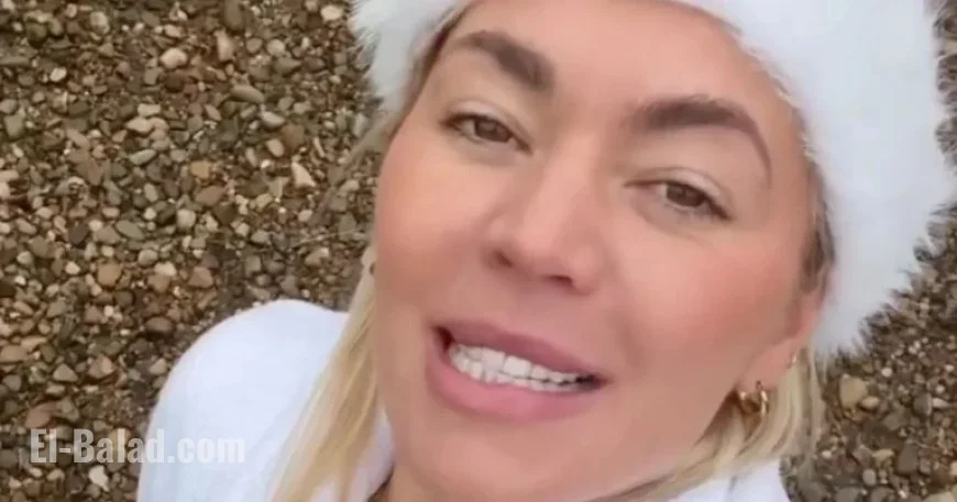 Danni Menzies Braves Lake Dip in Skimpy Red Bikini