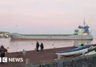 Cargo Ship Grounds in Teignmouth Harbor, Disrupting Traffic