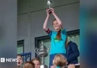 Girls’ Football Team Awarded Small Cup, Boys Win Full-Size Trophy