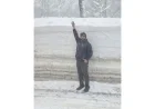 Viral Photo Reveals Story of DOT Worker with 8-Foot Snowbank