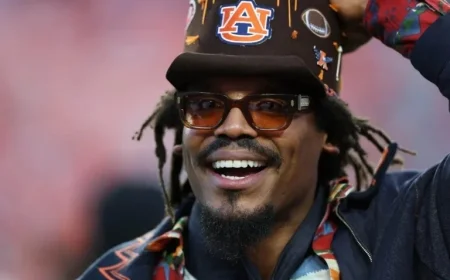 Cam Newton Joins Panthers for Rams Playoff Showdown