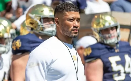 Wrestling Coach Accuses Notre Dame’s Marcus Freeman of Battery