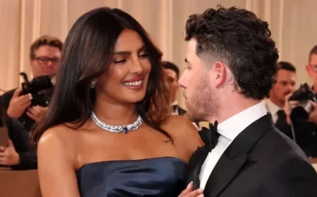 Priyanka Chopra Adjusts Nick Jonas’s Bow Tie at Golden Globes