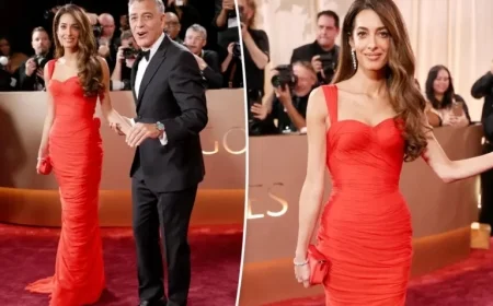 Amal Clooney Dazzles in Red on 2026 Golden Globes Red Carpet