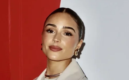 Olivia McCaffrey Stuns in 49ers Coat at Seahawks Game