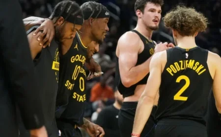 Warriors’ Jimmy Butler Exits Game Against Heat with Knee Injury