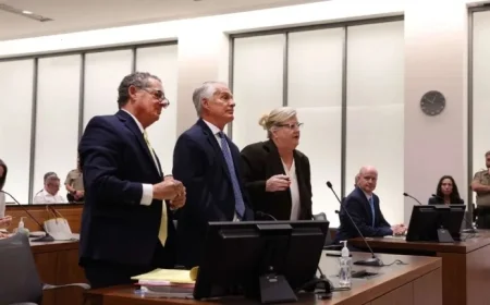 Widow Urges Quick Trial; Defense Seeks No Cameras in Courtroom