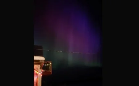 Northern Lights Illuminate Sky with Deep Purples and Greens Today