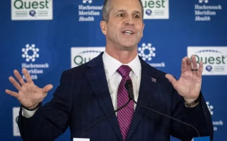 Giants Dismiss Longtime Executive as John Harbaugh Arrives