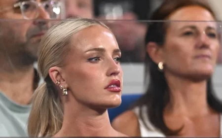 Morgan Riddle Stuns in Sheer Black Dress at Australian Open