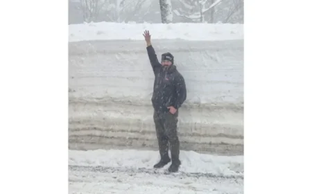 Viral Photo Reveals Story of DOT Worker with 8-Foot Snowbank