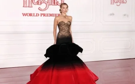 Margot Robbie Stuns in Crimson Gown Before Wuthering Heights Premiere