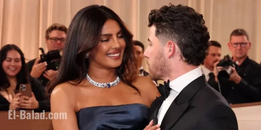 Priyanka Chopra Adjusts Nick Jonas’s Bow Tie at Golden Globes