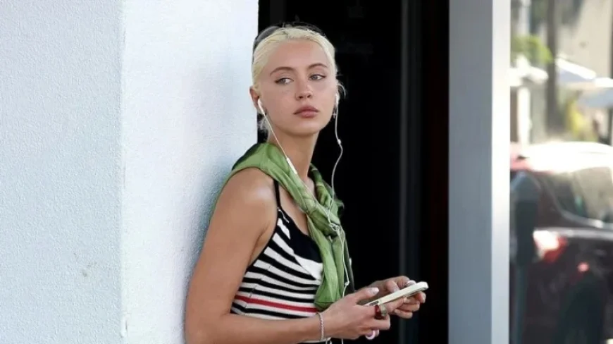 Iris Law Wears Kim Kardashian’s NikeSkims Split-Toe Shoes