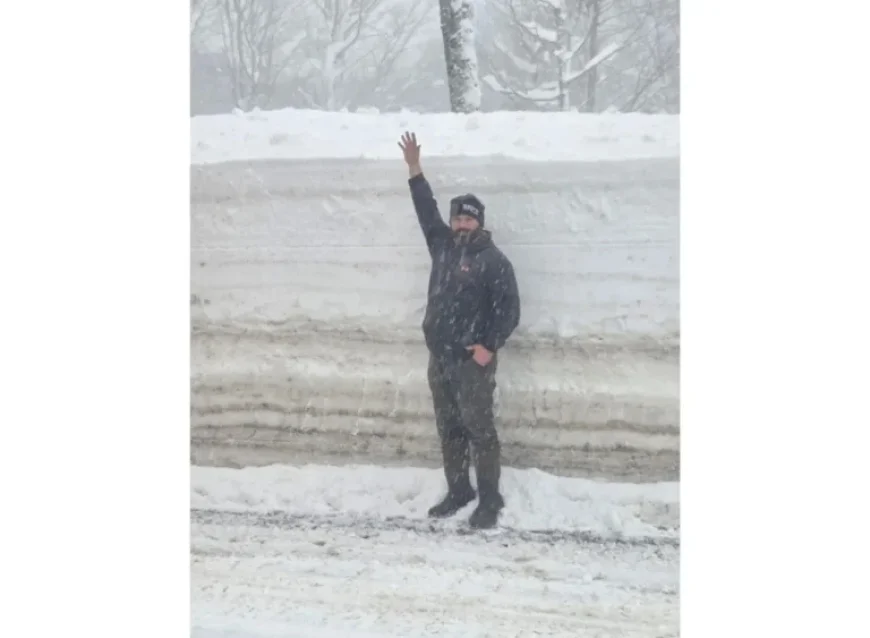 Viral Photo Reveals Story of DOT Worker with 8-Foot Snowbank