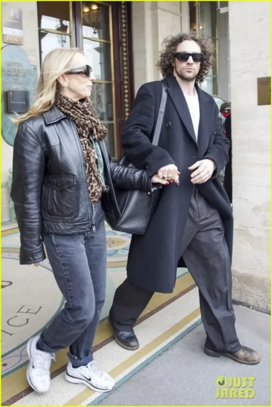 Aaron Taylor-Johnson and Wife Sam Depart Paris Hotel Hand in Hand