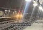 New York Train Strikes Snow and Ice, Sparks Fly