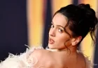 Rosalía Stuns in Backless Feathery Ensemble at BRIT Awards