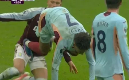 Kevin Schade Receives Red Card for Stamping on Matty Cash’s Privates