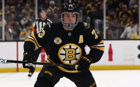 Bruins Defenseman Exits Ice After Elbow to Head Incident