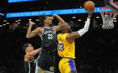 Doncic and James Lead Lakers to Victory Over Nets as Reaves Returns