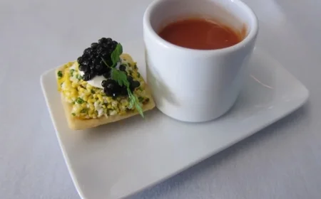 “American Marks 100th Anniversary with Beef Wellington and Caviar”