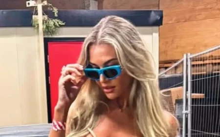 Christine McGuinness Stuns in PVC Hotpants, Plunging Top, and Fishnet Tights