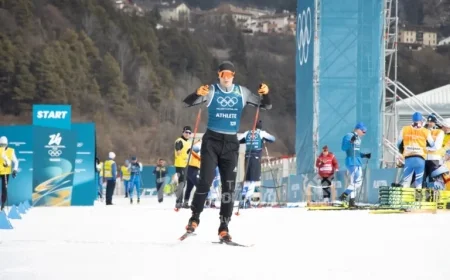 Iulian Luchin Leads Moldova as Flag Bearer at Winter Olympics Closing Ceremony