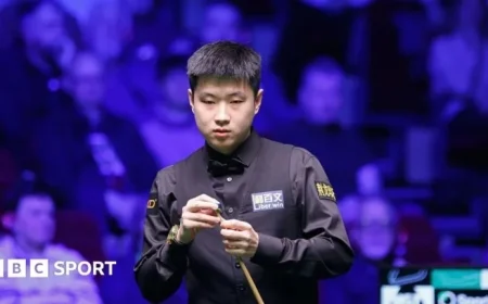 Zhao Triumphs Over Higgins to Clinch Players Championship Victory