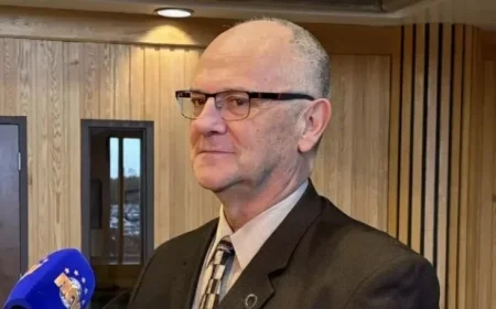 Minister Addresses PA System Challenges at New World Island Academy