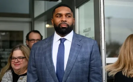 Investigation into Ex-UM Assistant Assault Claims: Moore Cleared by Lawyer