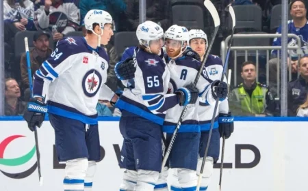 Jets Triumph Over Canucks as Perfetti Scores in Overtime