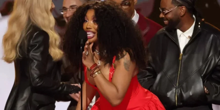 SZA Stuns at 2026 Grammys in Bold Red Plunging Dress