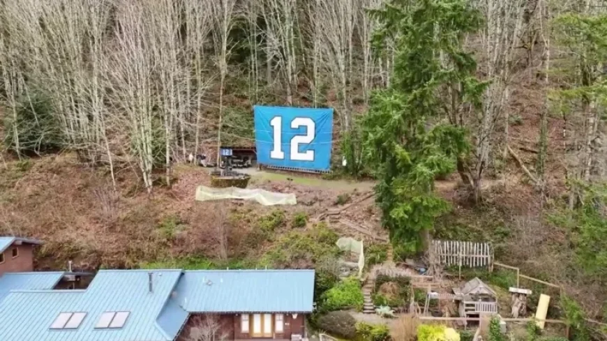 Issaquah Duo Creates Iconic ’12’ Banner Overlooking I-90