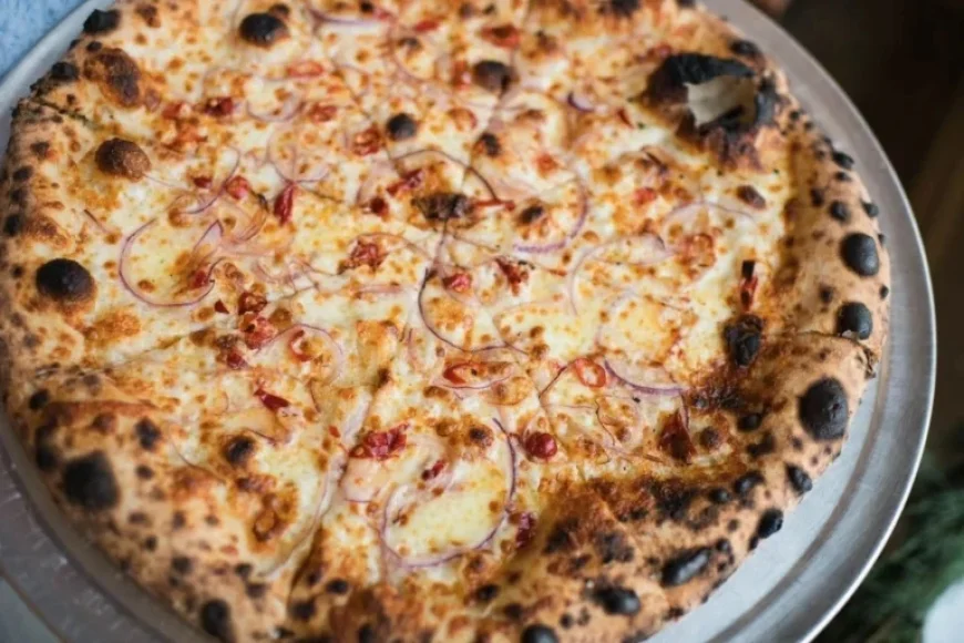 Celebrate National Pizza Day with Our Local Guide