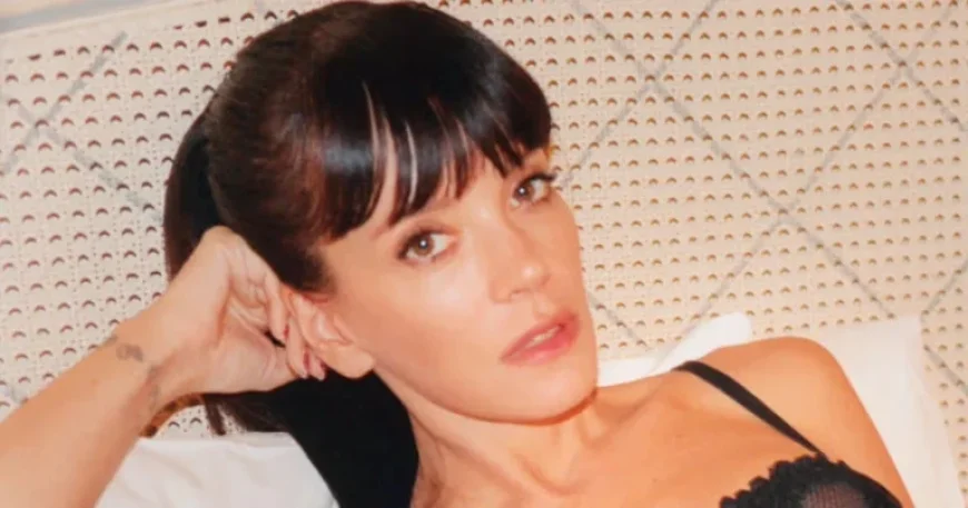 Lily Allen’s Robe Reveals Lingerie and Stockings