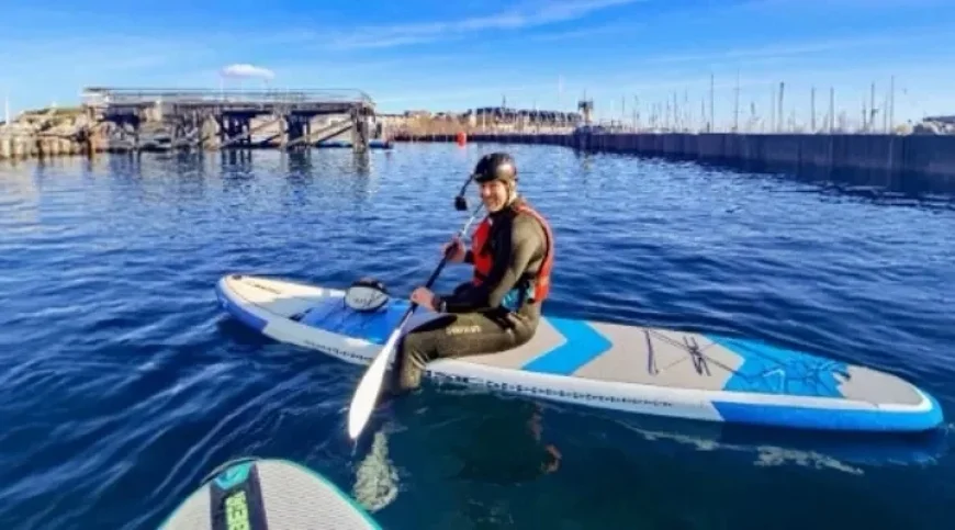 Alun Wyn Jones Paddleboards with Fans in Cardiff Bay Before Six Nations Fixture