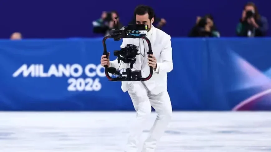 Cameraman in White Suit Steals the Show at Winter Olympics