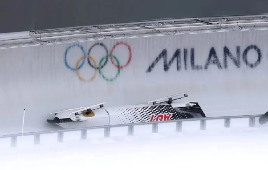 Austrian Bobsled Overturns in Olympic Race, Injuring Team Member