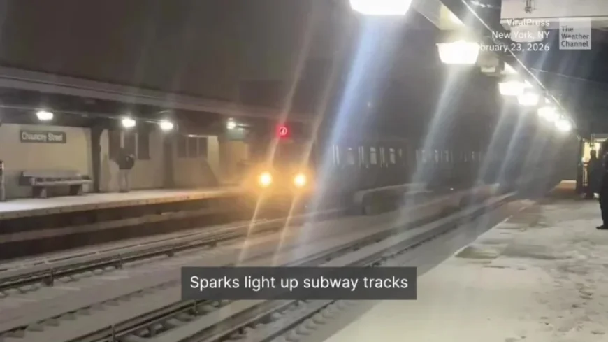 New York Train Strikes Snow and Ice, Sparks Fly