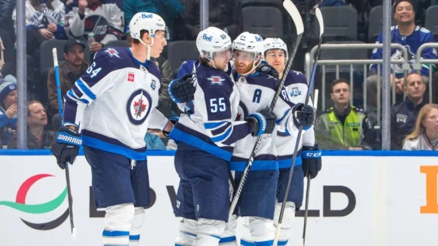 Jets Triumph Over Canucks as Perfetti Scores in Overtime