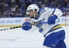 Blues Trade Faulk to Red Wings for Picks, Prospect Buchelnikov