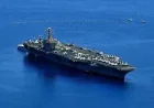 Uss Abraham Lincoln at the center of a clash of claims: a ship approached, shots were fired, and damage allegations collide