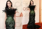 Demi Moore goes full peacock in feathered fashion on Oscars 2026 red carpet