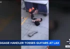 Lax and the guitars on the tarmac: one viral clip, a traveler’s unease