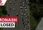 Monash Freeway closed after serious crash as biker fights for life