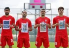 Iran Soccer players honor alleged child victims before World Cup warmup